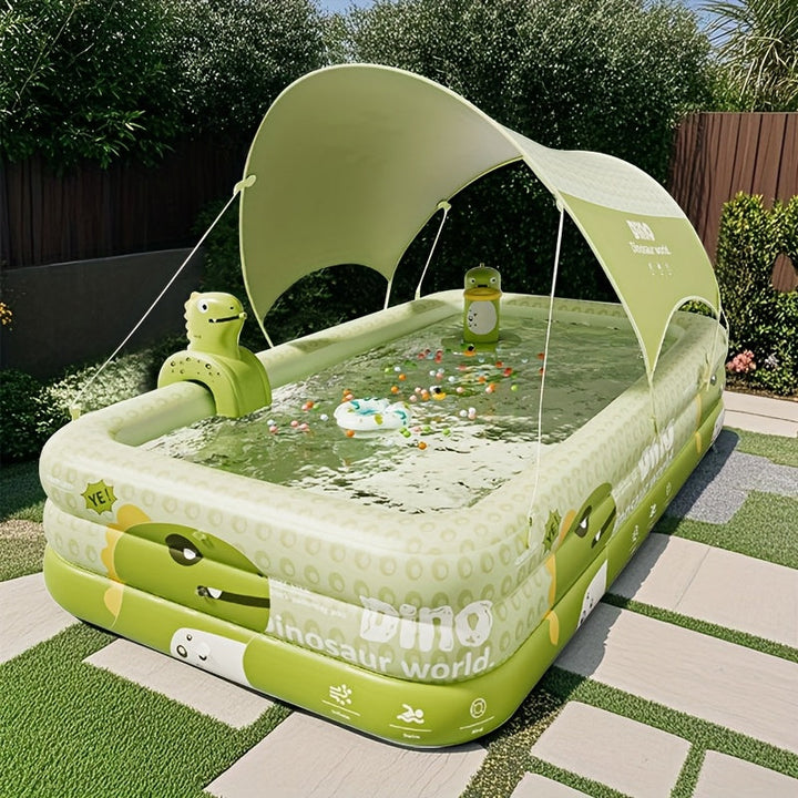 Aufblasbares Kinderplanschbecken mit UV-Sonnendach und Dino-Wassersprüher für sicheren Spielspaß im Garten.