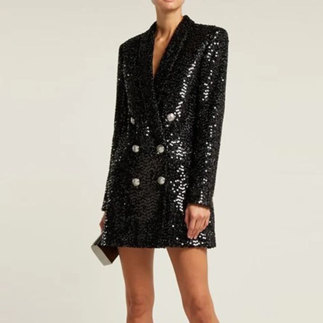 Funkelnder schwarzer Damen Jumpsuit mit Pailletten-Oberteil und elegantem Blazer-Schnitt.