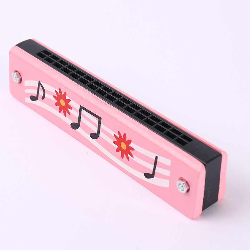 Geschenkidee für Kinder: Bunte Mundharmonika als einfaches Musiklernspielzeug.