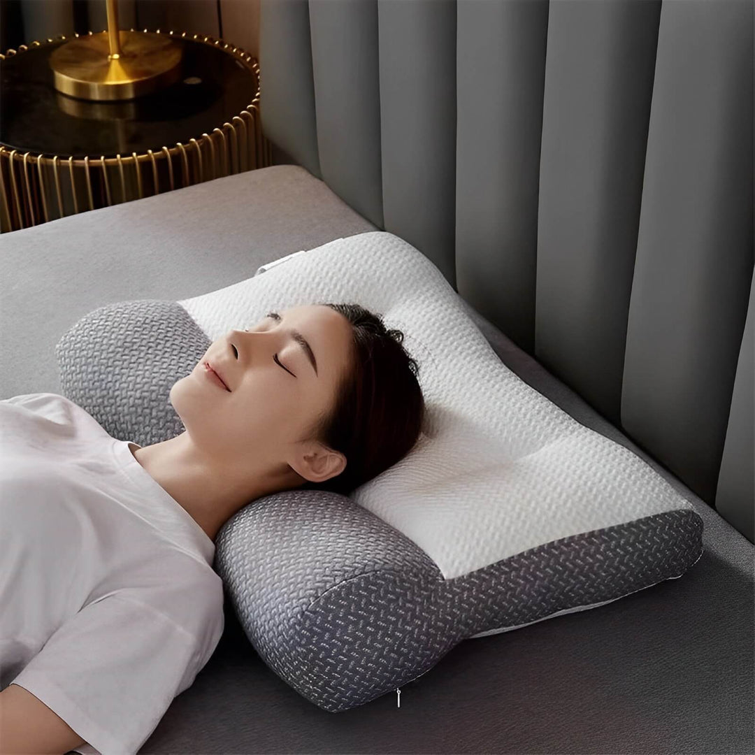 Graues ergonomisches Nackenkissen aus Memoryschaum für optimalen Schlafkomfort und Linderung von Nackenschmerzen.
