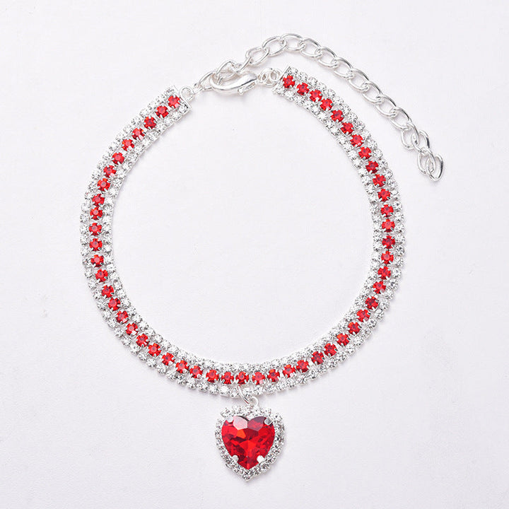 Luxuriöses Katzenhalsband mit Kristall-Herzanhänger & reflektierendem Design für Sicherheit.
