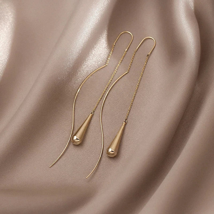 Goldene Wassertropfen-Ohrringe für Damen, eleganter Modeschmuck aus Legierung.