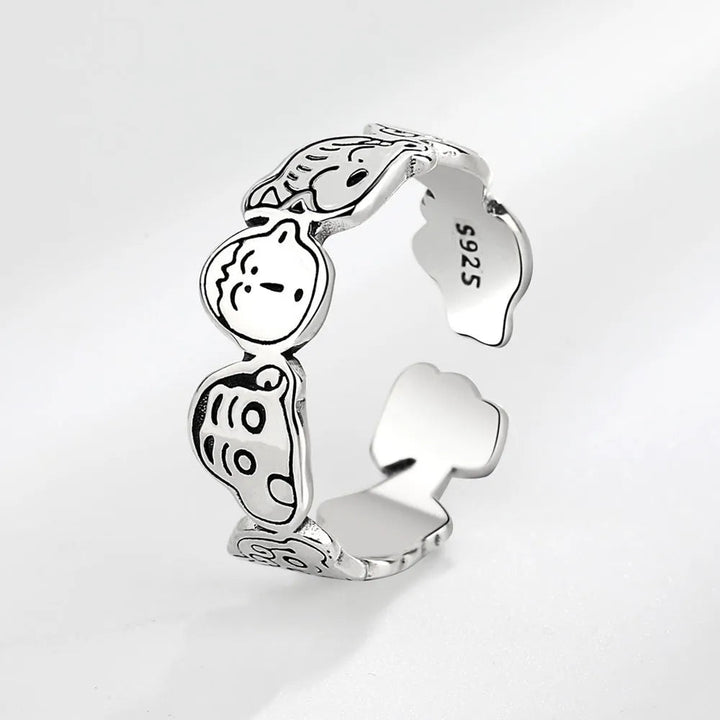 Unisex Skurriler Cartoon Gesichtsring aus Metall, verstellbar. Zeigt ein ausgefallenes, lachendes Comic-Gesicht. Einzigartiger Schmuck.