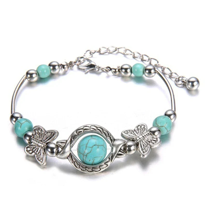 Damen Türkisperlen Armband mit filigranem Schmetterling aus Sterlingsilber, elegantes Schmuck-Accessoire.