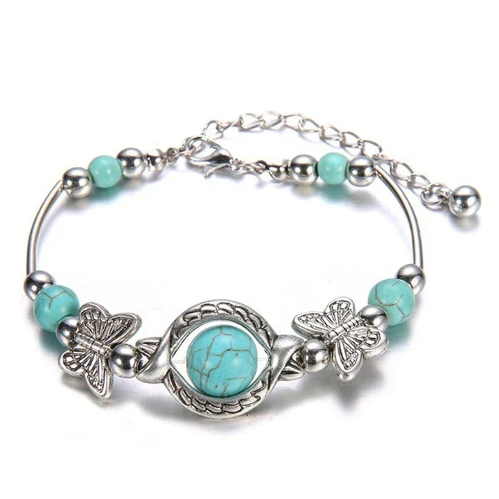 Damen Türkisperlen Armband mit filigranem Schmetterling aus Sterlingsilber, elegantes Schmuck-Accessoire.