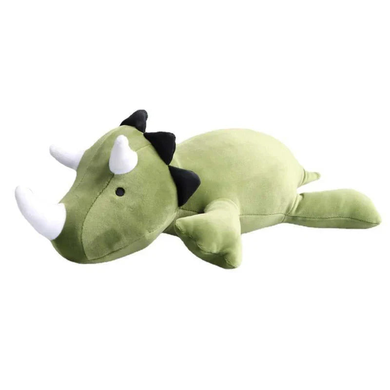 Gewichtetes Triceratops Plüschtier als stilvolle Schlafhilfe im Kinderzimmer. Fördert Entspannung & guten Schlaf.