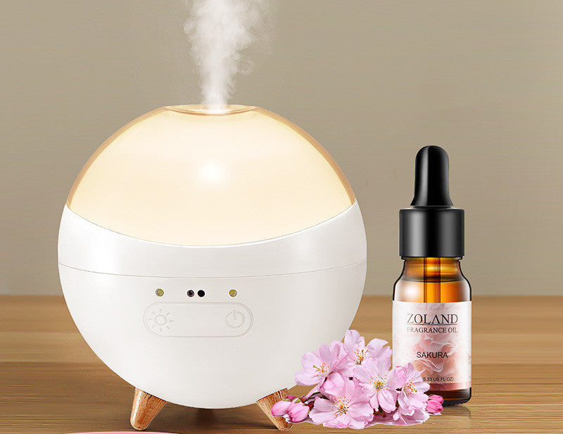 Schaffen Sie Wohlfühlatmosphäre mit diesem Aroma Diffuser und Luftbefeuchter, gesteuert per Geste, mit LED-Licht.