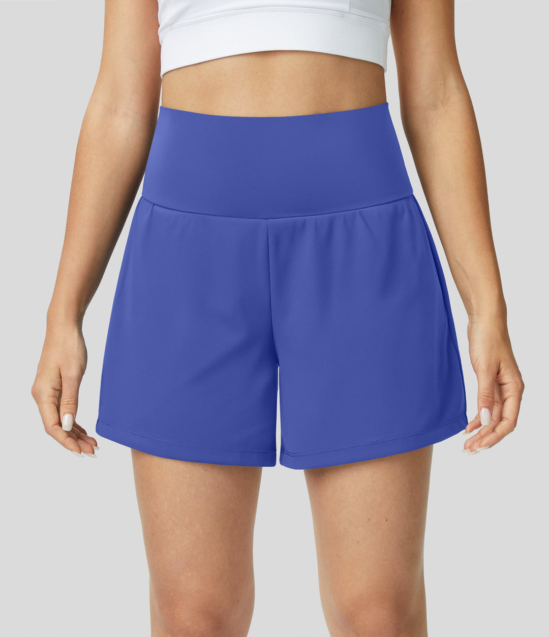 Ergonomische Damen High Waist Laufshorts mit Innenshorts und sicheren Taschen.