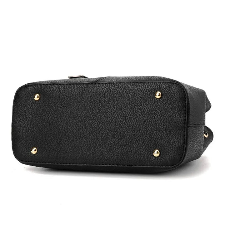 Detailaufnahme des Verschlusses der Damen Handtasche. Sicherer & eleganter Magnetverschluss.