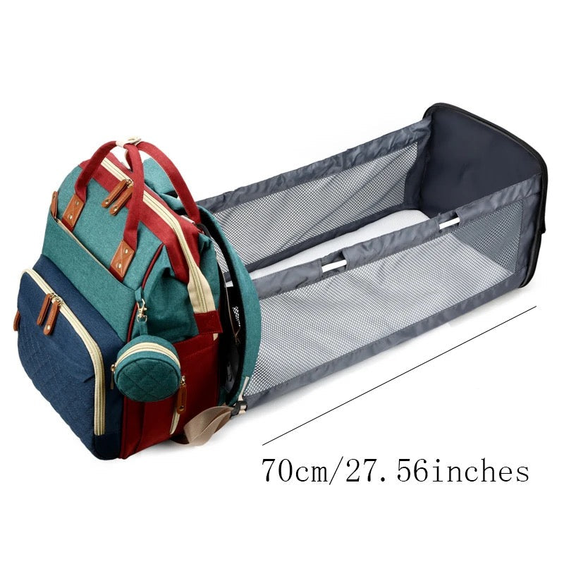Hochwertiger Wickelrucksack mit integriertem Wickelbett. Der perfekte Begleiter für Eltern & Baby unterwegs.