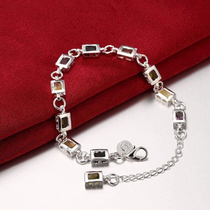 Zeitloses Unisex Silberarmband mit Zirkon-Edelsteinen, ideal für tägliche Eleganz & besondere Anlässe.