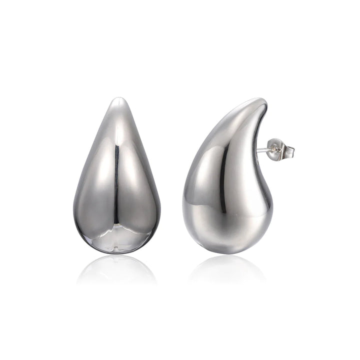Moderne Tropfenohrringe GlimmerDrops, goldener Damenschmuck, schimmernd und elegant für Frauen.