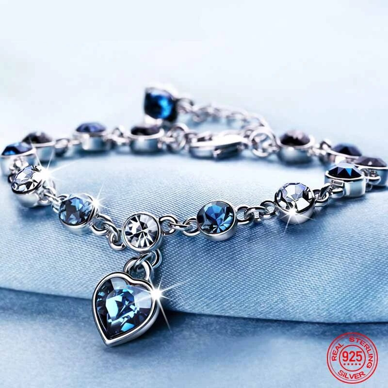 Glänzendes Damenarmband 'Herz des Ozeans' aus Kristall & Silber, ein schönes Accessoire.