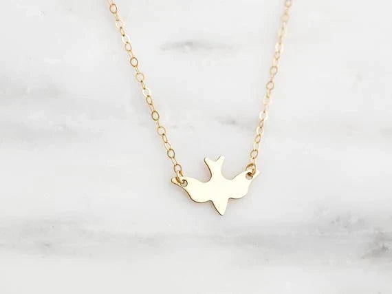 Minimalistische Damen-Halskette mit fliegendem Vogel-Anhänger, Freiheitssymbol, elegante Goldkette.