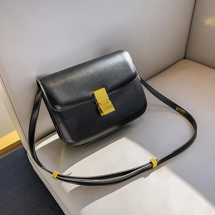 Stilvolle braune Damen Designer Handtasche. Kleine, quadratische Tofu-Tasche.