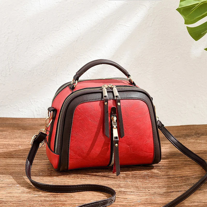 Modische Damen Schultertasche im Alligator-Design. Trendiges Accessoire für anspruchsvolle Frauen.
