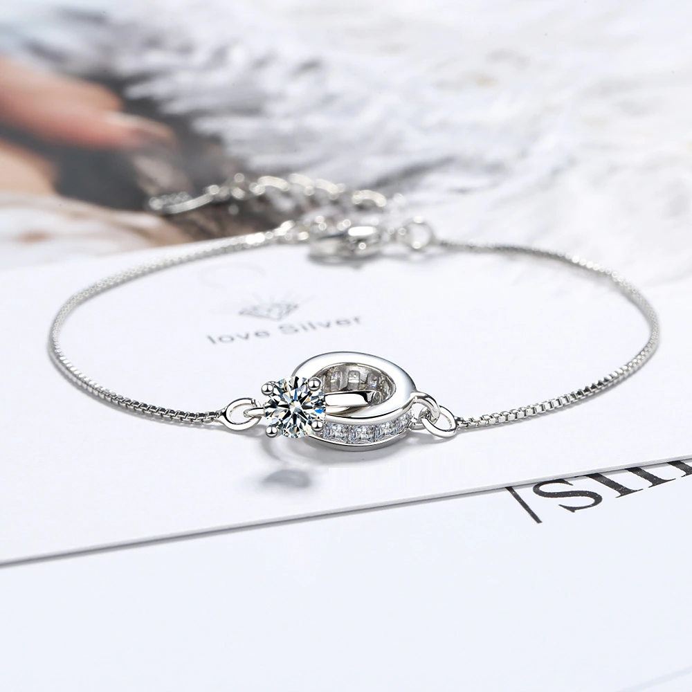 Elegantes Damen Sterling Silber Armband mit funkelndem Ehering-Anhänger & Zirkonia Steinen.