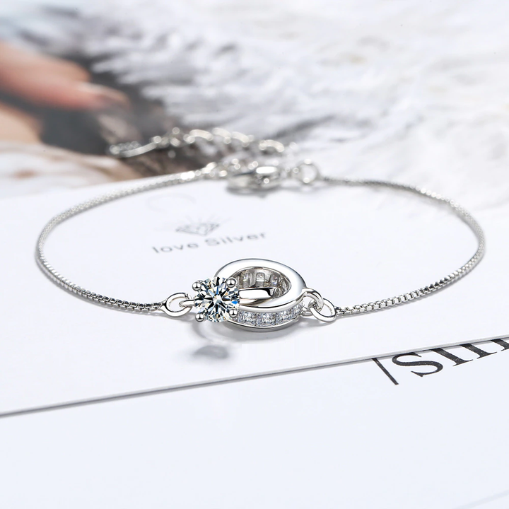 Elegantes Damen Sterling Silber Armband mit funkelndem Ehering-Anhänger & Zirkonia Steinen.