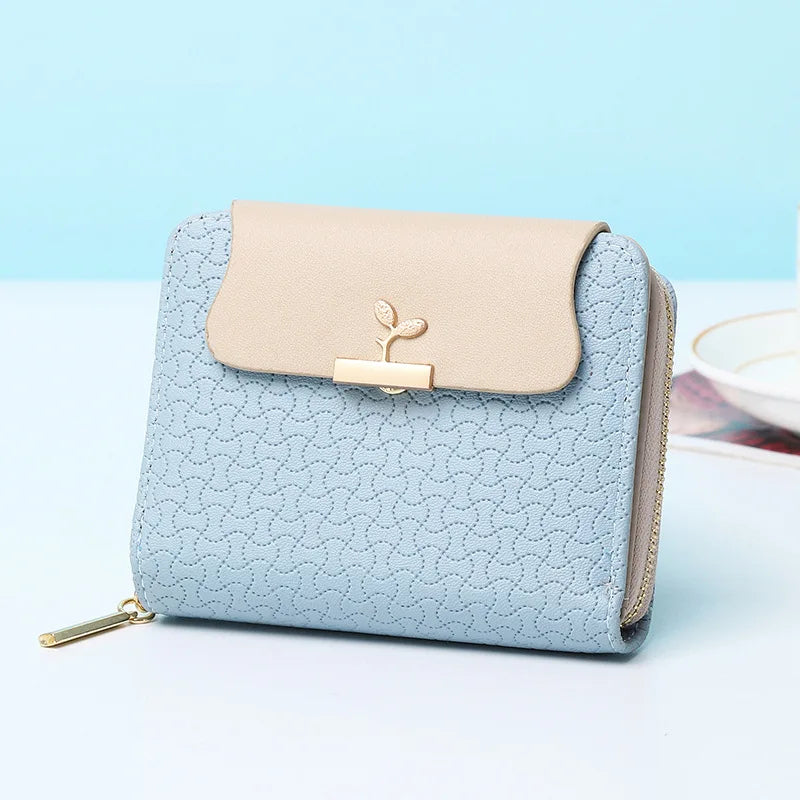 Elegante Damen Clutch Geldbörse mit Blattmotiv und praktischem Kartenhalter.