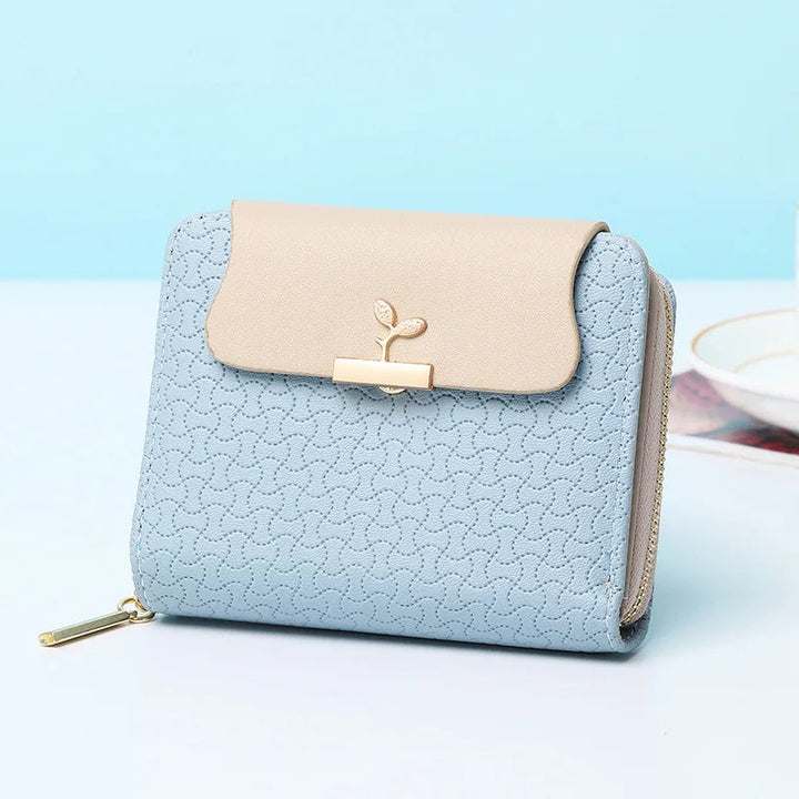 Elegante Damen Clutch Geldbörse mit Blattmotiv und praktischem Kartenhalter.