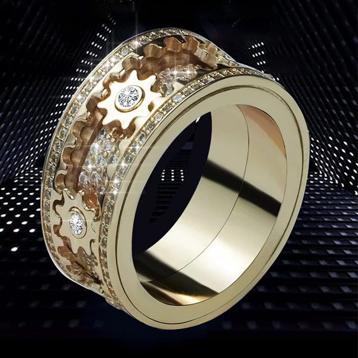 Luxuriöser roségoldener Fidget Damenring, verziert mit Zirkonia-Kristallen und eleganten, drehbaren Zahnrädern.
