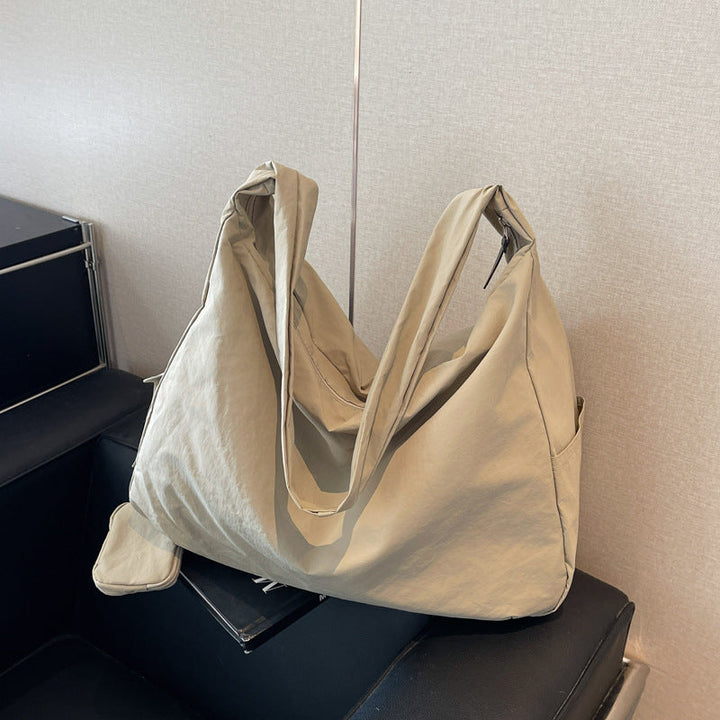Moderne Damen Crossbody Tasche, Kaffeebraun, perfekt für den urbanen Lifestyle, mit Reißverschluss.