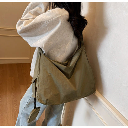 Elegante Damen Hobo-Schultertasche, Kaffeebraun, mit sicherem Reißverschluss & vorderer Außentasche.