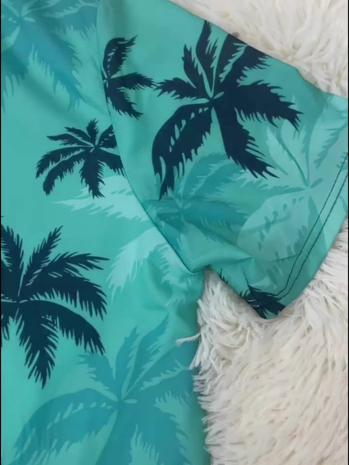 Atmungsaktives Herren Kurzarmhemd mit exotischem Palmenmuster. Lässiges Sommerhemd für Strand und Freizeit.