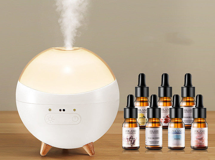 Detailansicht des Aroma Diffusers: Sanfter Nebel, leuchtendes Stimmungslicht und Gestenerkennung für Komfort.