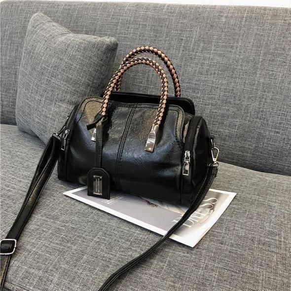 Schwarze Retro Ledertasche für Damen, große Schultertasche mit Tragegriffen.