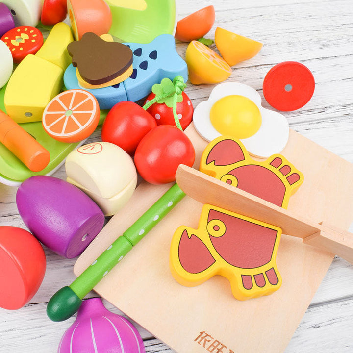 Vielfältiges Montessori Schneidespielzeug aus Holz: Set mit verschiedenen Obst- & Gemüsesorten für kleine Köche.