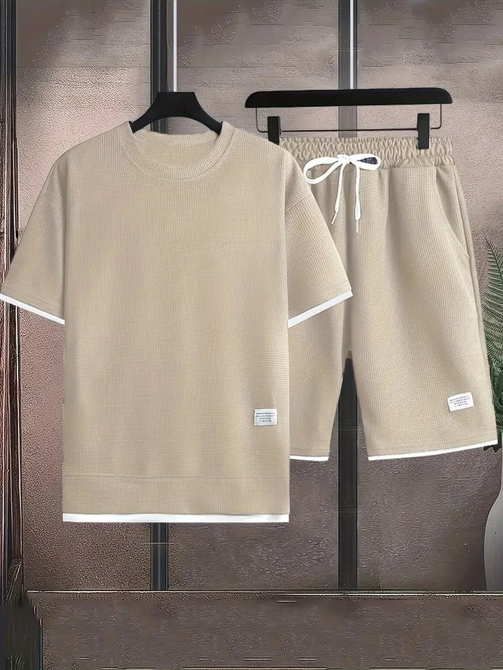 Herren Zweiteiler Waffelstrick: bequemes Kurzarmshirt & Shorts, atmungsaktiv für Sommer.