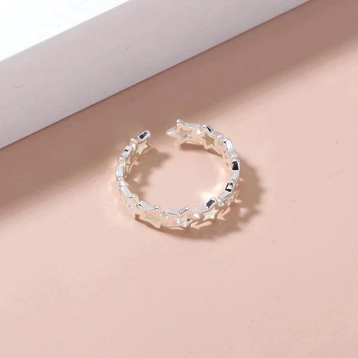 Glitzernder, leuchtender Sternring für Damen, verstellbar. Einzigartiger Damenschmuck und Geschenkidee für Hoffnung.