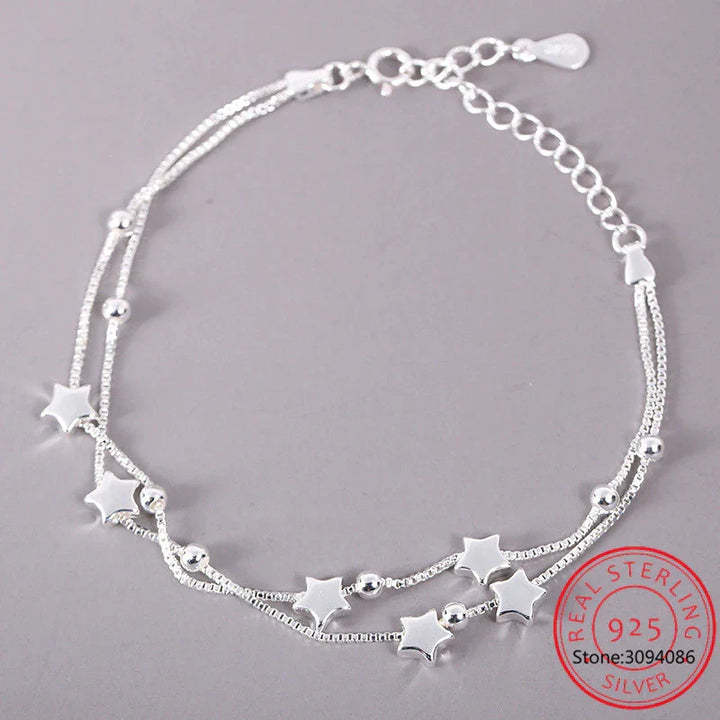 Elegantes Damen Armband mit Stern-Anhänger, aus glänzendem Silber, als Geschenk ideal.
