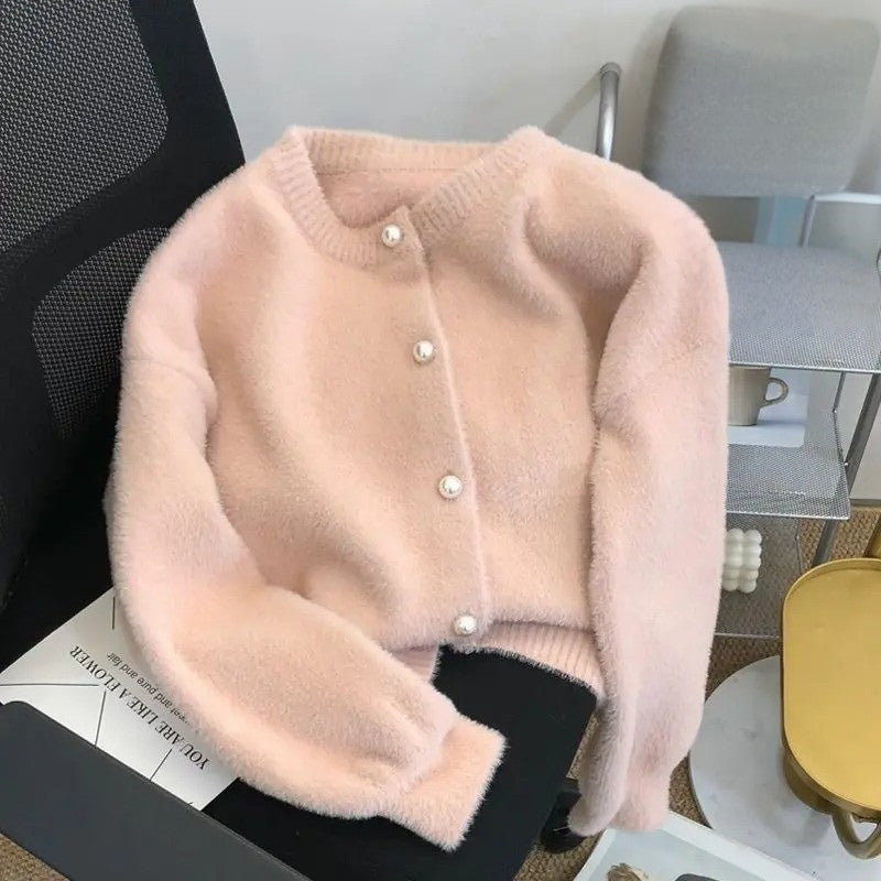 Modische Damen Strickweste für den Herbst. Warme, bequeme Weste mit Rundhalsausschnitt für stilvolle Outfits.