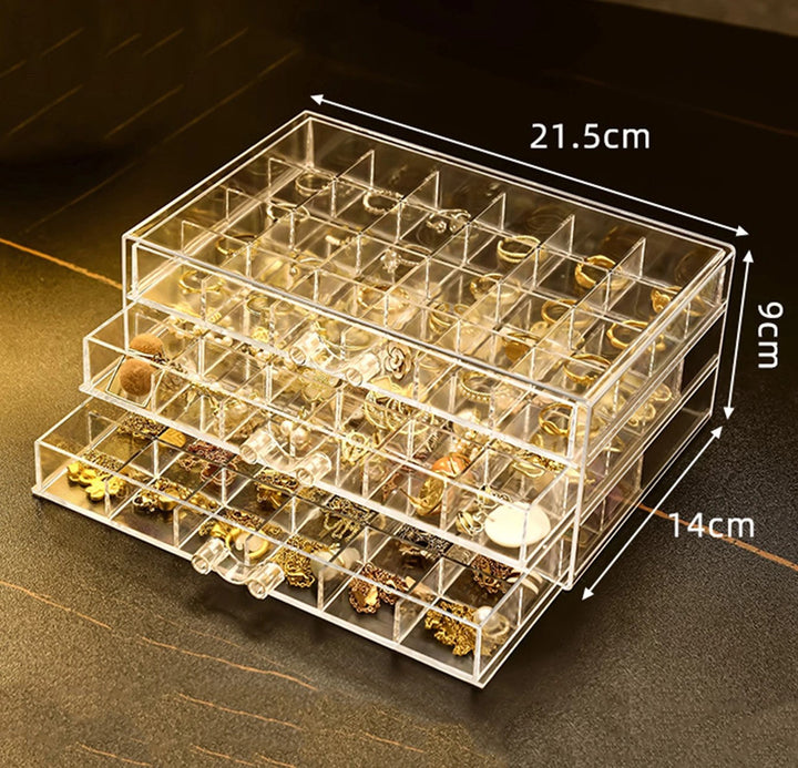 Eleganter, transparenter Acryl-Schmuckorganisator mit mehreren Ebenen für Ohrringe, Ringe und Halsketten. Sorgt für Ordnung.