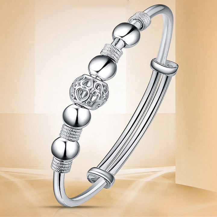 Verstellbares 925er Silberarmband für Damen, mit runden Glücksperlen, ideale Geschenkidee für Sie.