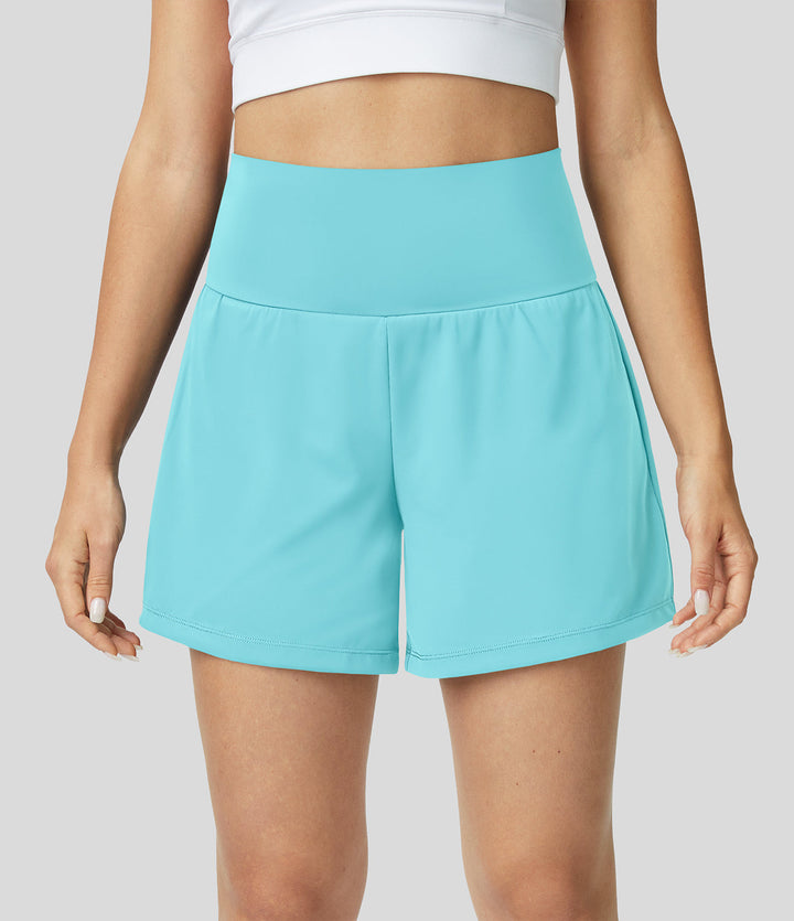Damen Fitness Shorts 2-in-1 mit hohem Bund und cleveren Taschen, optimal für jedes Workout.