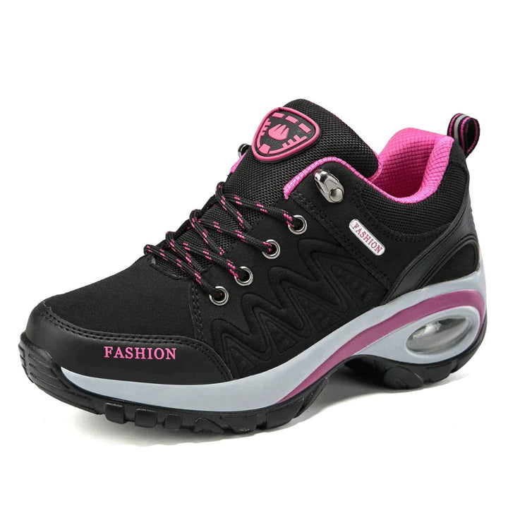 Bequeme schwarze orthopädische Damen-Sneakers. Ergonomisch & atmungsaktiv mit stabiler Fußgewölbestütze.