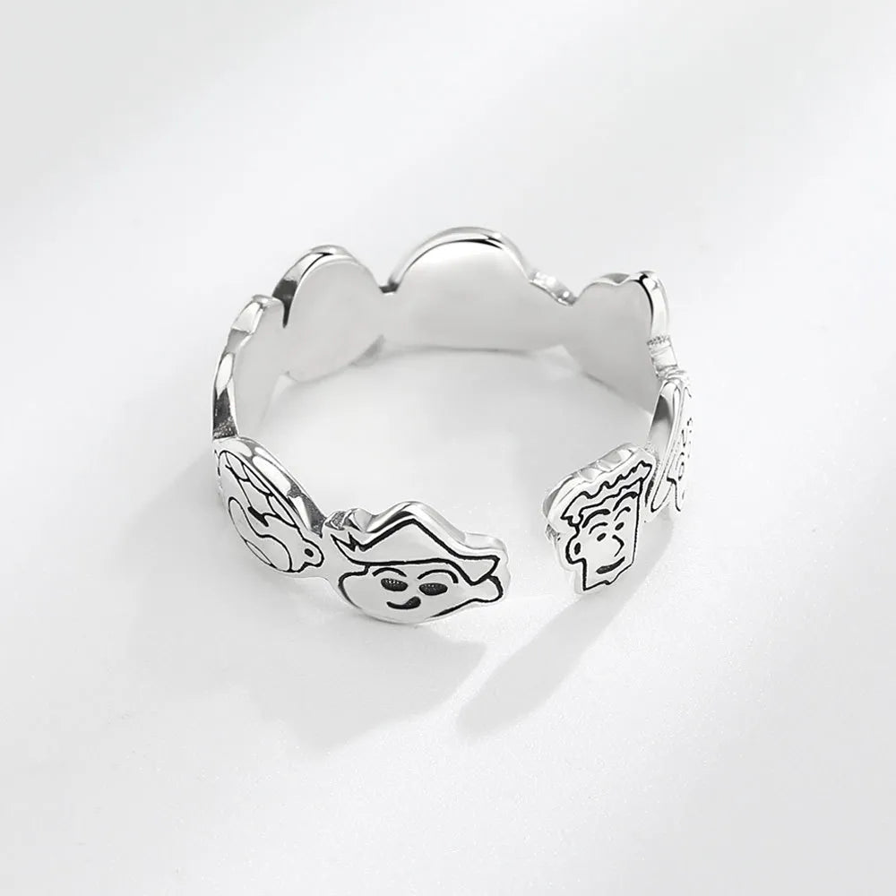Verstellbarer Cartoon-Gesichtsring aus Kupfer, unisex. Skurriles Design mit lachendem Gesicht. Origineller Metallschmuck.
