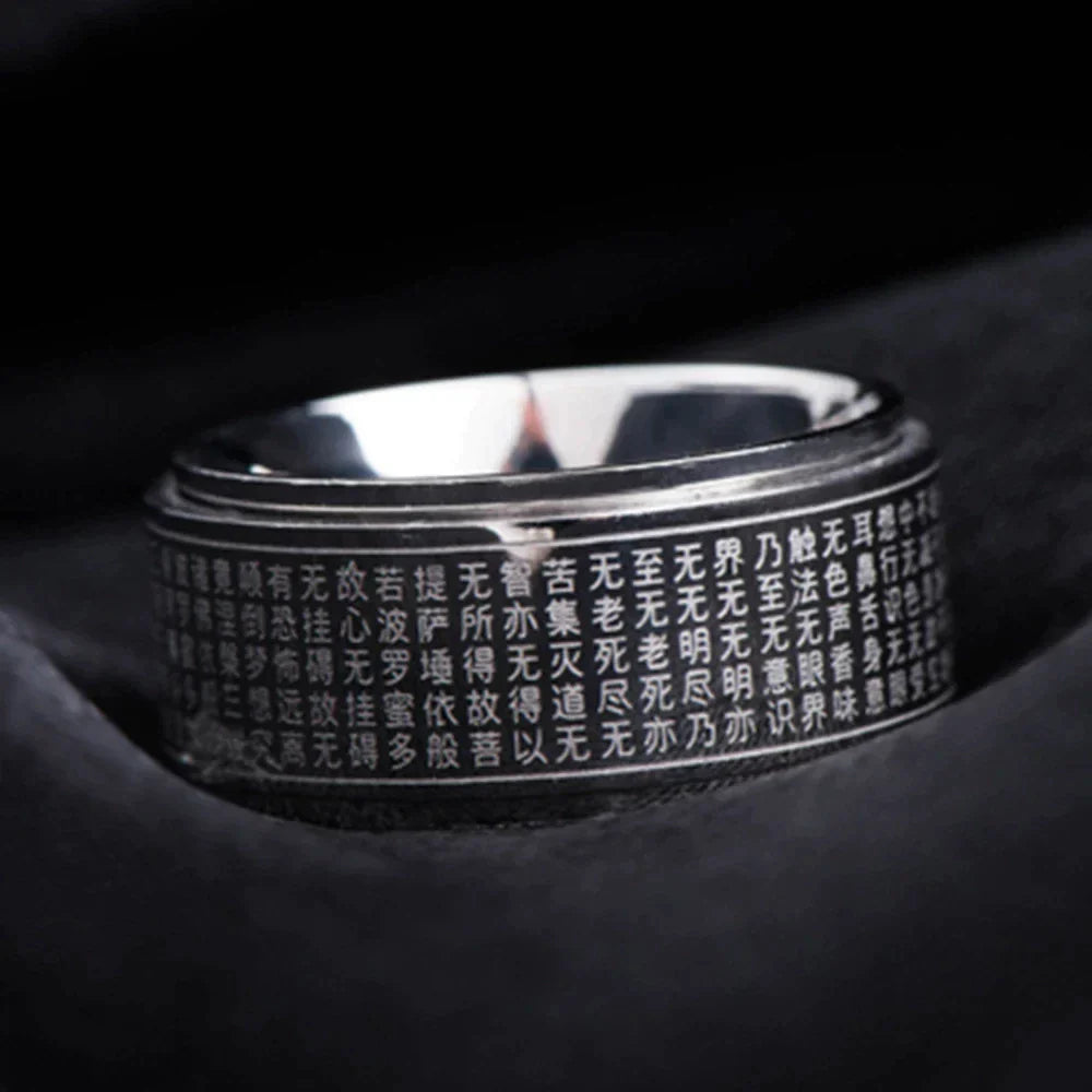 Rotierender Feng-Shui Zappelring aus glänzendem Edelstahl. Unisex Mantra Ring für Fokus & innere Ruhe.