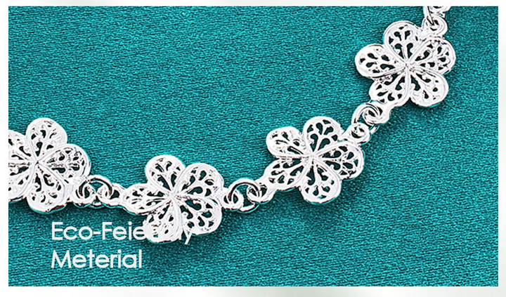 Glänzendes 925 Sterling Silberarmband für Damen, filigranes Blumendesign, ein zeitloser Schmuckklassiker.