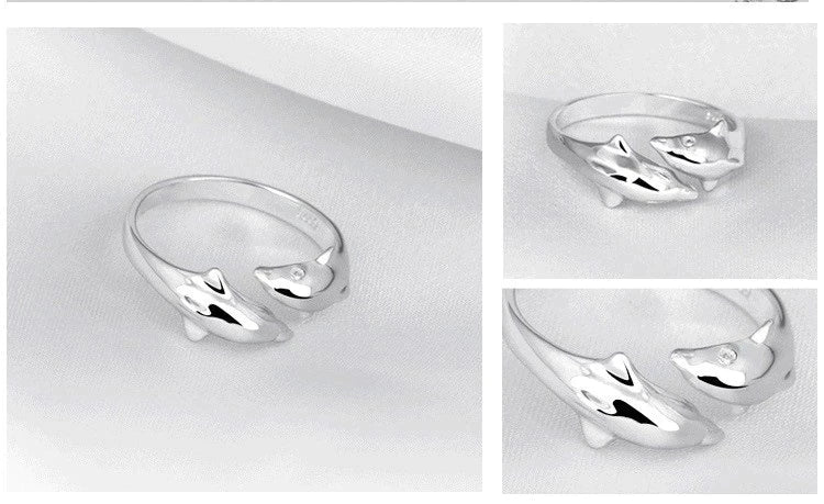 Wunderschöner Damen-Silberring als Geschenk, mit zwei Delfinen – ein eleganter Symbolschmuck im Meeresthema.