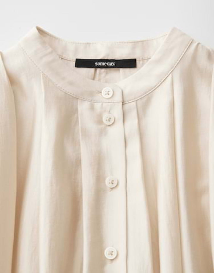 Vielseitige Damen Bluse, elegant drapiert mit Rundhalsausschnitt. Perfekt für Freizeit und gehobene Anlässe.