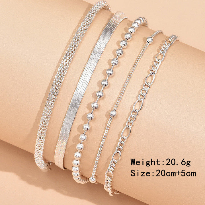 Blickfang am Knöchel: Damen Fußkettchen mit Perlen und einzigartiger Schlangenkette. Trendiger Sommerschmuck.
