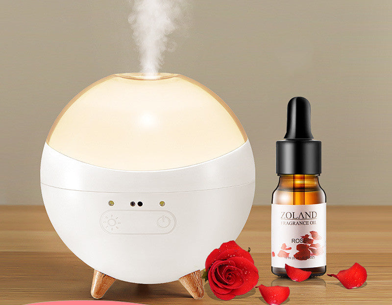 Ultraschall Aroma Diffuser mit sanftem Nebel und LED-Stimmungslicht, einfach zu steuern durch Handgesten.