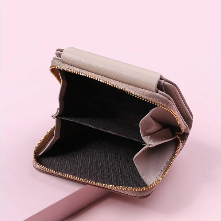 Damen Blätter Clutch Geldbörse mit elegantem Design und Funktionalität.