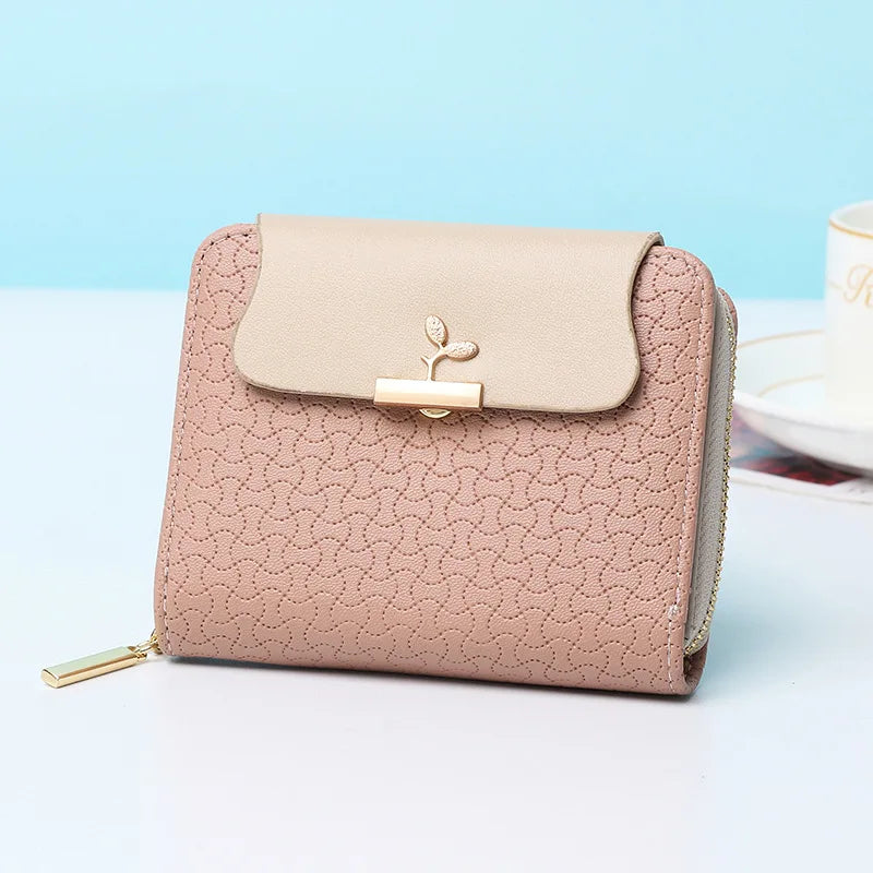 Schicke Damen Geldbörse im Blatt Design, ideal als Clutch oder Portemonnaie.