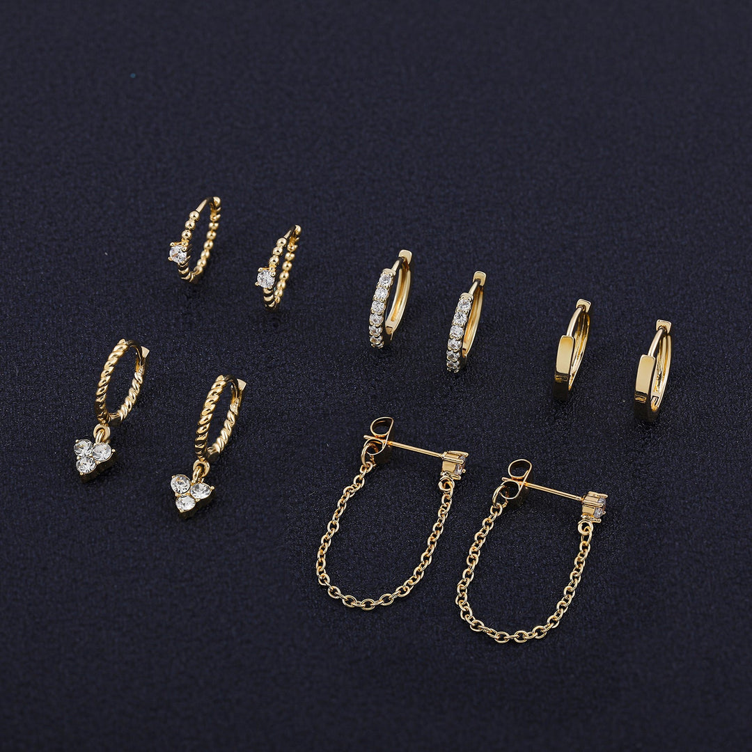 Hochwertige Edelstahl Herzohrringe mit Zirkonia, im eleganten Retro Tropfenohrring-Design.