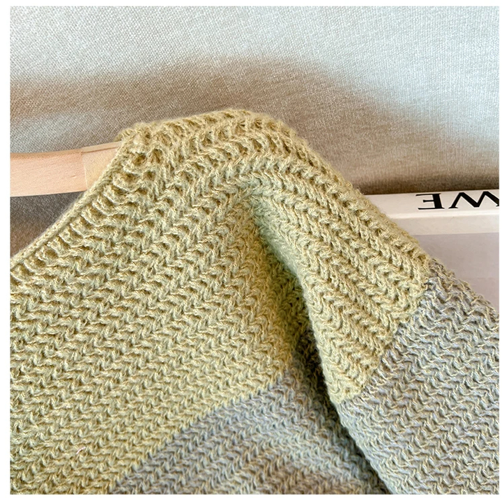 Modischer Herbstpullover Damen Übergröße. Kuschelig weich, mit farbigem Patchworkmuster für Lässigkeit.